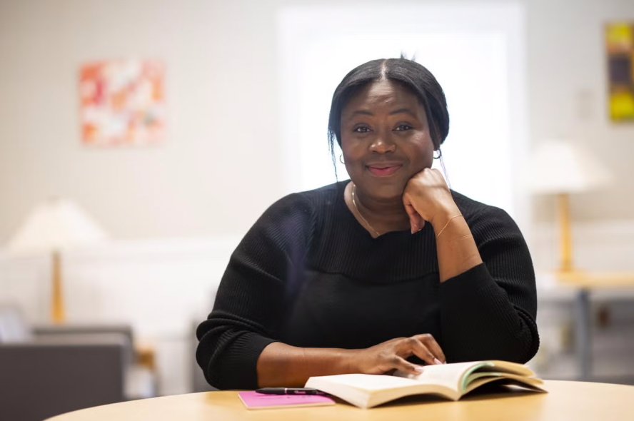 Clara Mabour, a third-year doctoral candidate in Education, poses for a portrait.